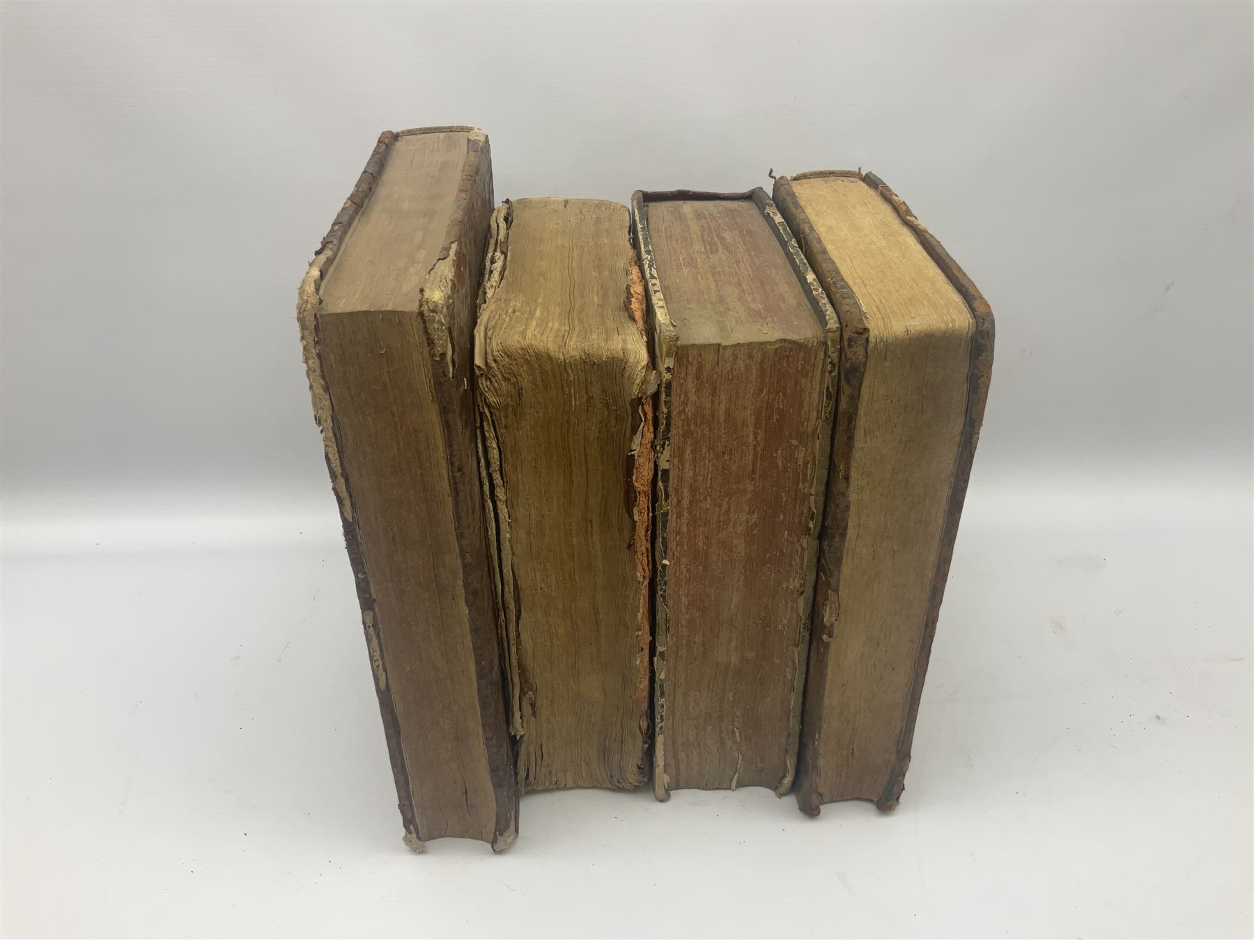 Sancti Gregorii Magni Papae Primi Opera , Sixti V Pont Max Iussu .... 1640 Paris. Two volumes in one with engraved galleon to each title page; R.P. Joan. Stephani Menochij Doctoris Theologi E Societate Jesu .... Editio Novissima .... Tomus Primus. 1683 Lugduni Francisci Comba; and two other similar leather bound folio volumes lacking title pages (4)