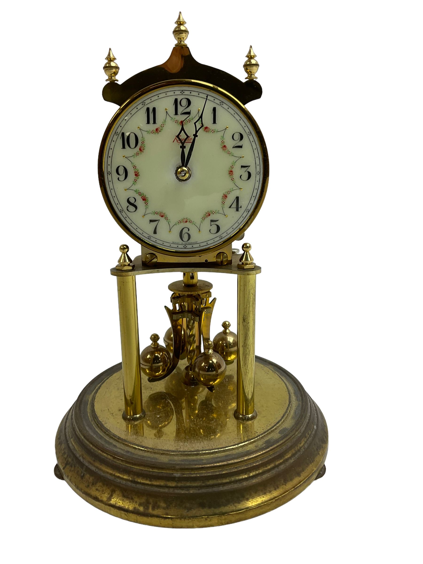 Kendo torsion clock with a glass dome