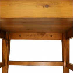 Pair of 20th century full-size pine Orkney chairs, high-back armchairs of traditional design, pegged and wedged construction, wrap-around backrest and sides, above scrolled out-swept arms and solid rounded pine seat, raised on square tapering legs united by stretchers, hand-signed ‘Jackie Miller’ and stamped ‘Orkney’
