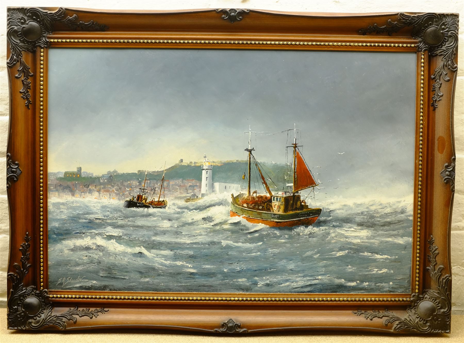 Robert Sheader (British 20th century): Trawlers Returning to Scarborough, oil on board signed 50cm x 75cm