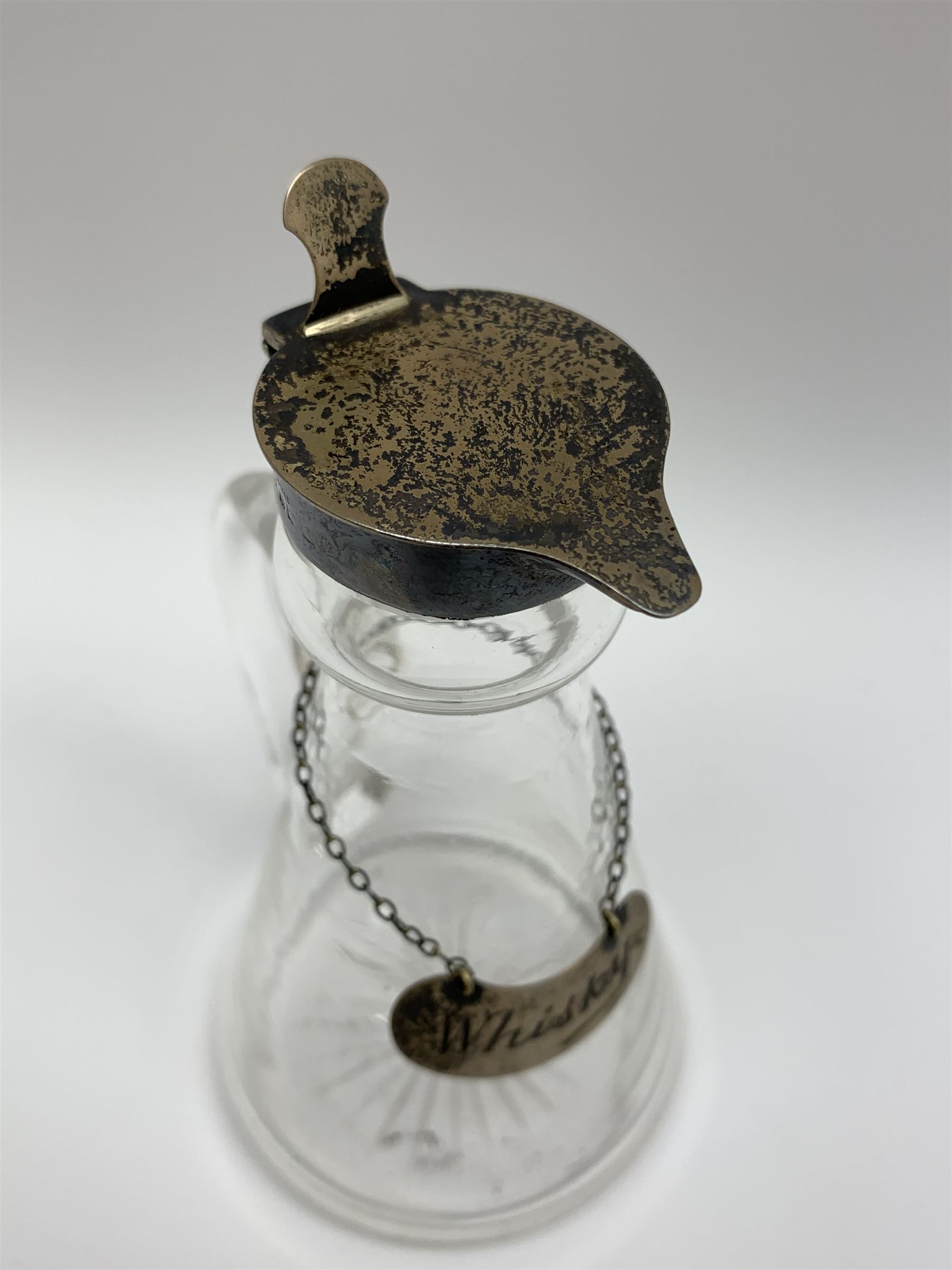 Edwardian silver mounted whisky noggin, of tapering cylindrical form with hinged flat cover, H12cm, together with a silver whisky label, each hallmarked H B Johnson & Co, London, whisky noggin dated 1906, label 1910