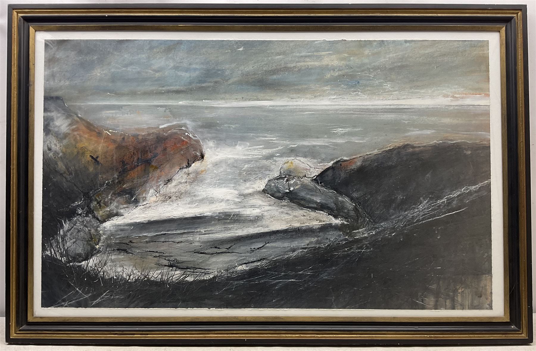 David Baumforth (British 1945-): 'Seagulls Hovering over Little Thornwick Bay Flamborough', mixed media on paper, signed titled and dated '96 on label verso 68cm x 113cm 
Provenance: with Walker Galleries, Harrogate, exhibition label verso