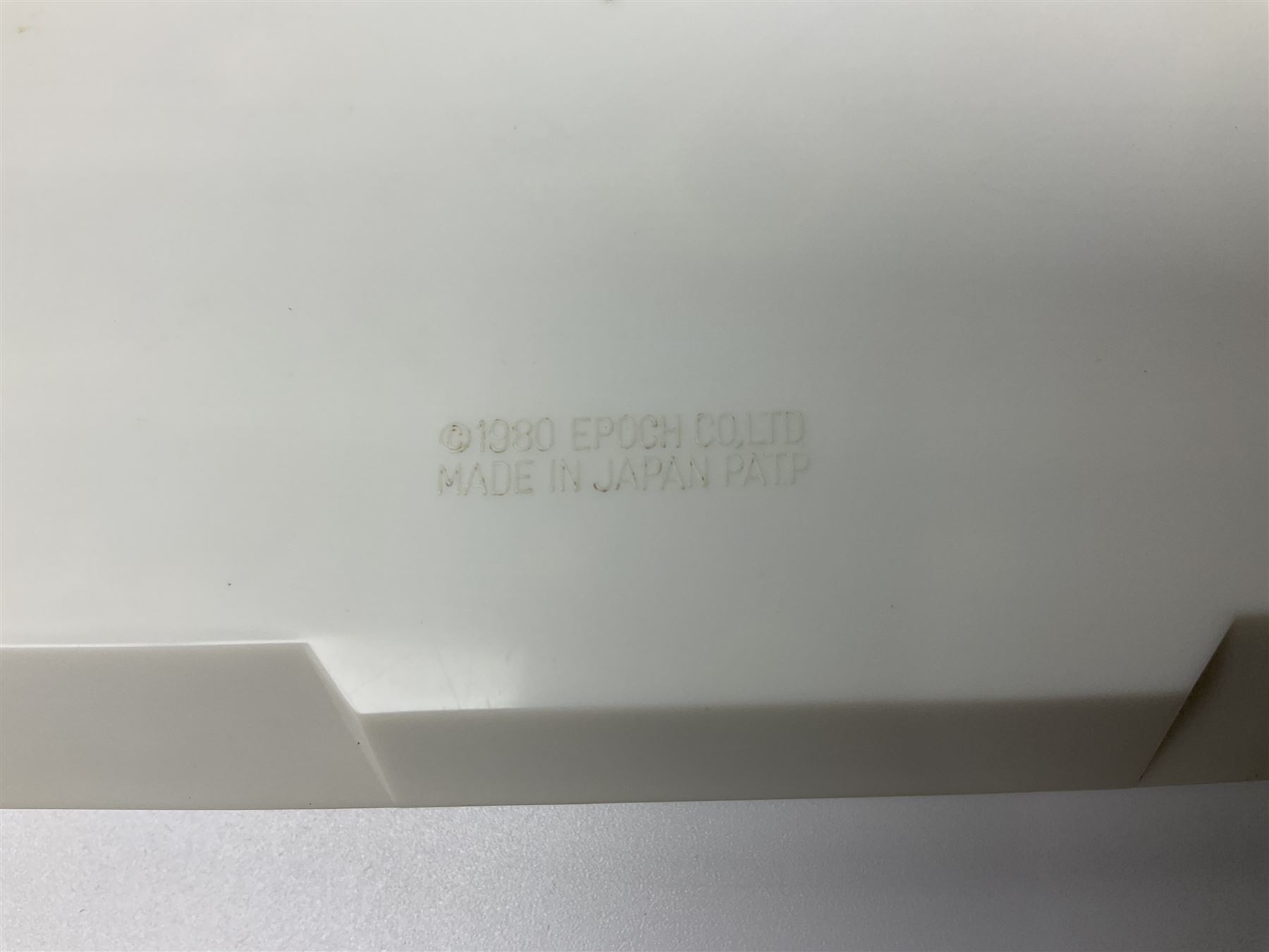 Three late 70s/early 80s handheld electronic games; Bandai Electronics Arcade ‘Gunfighter’ (1980), Grandstand ‘Invader From Space’ (1980), Palitoy ‘Merlin The Electronic Game Machine’ (1979) with game sheet and instruction booklet, all with original boxes (3) 