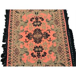 Persian Tabriz design fushia ground rug or wall hanging, central foliate medallion surrounded by rinceaux patterns, border decorated with stylised palmettes and large fringe 