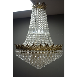  Gilt metal six light chandelier or cornet form, hung with cascading glass drops and strings of faceted cut glass beads, H72cm x D46cm   