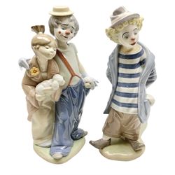 Two Lladro figures, Pals Forever no 7686 and Little Traveller no 7602, both with original boxes, largest example H24cm