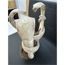 Taxidermy; Mongoose (Herpestidae) fighting three Indian cobras (Naja naja), the cobras entwined around an adult mongoose, H27cm
