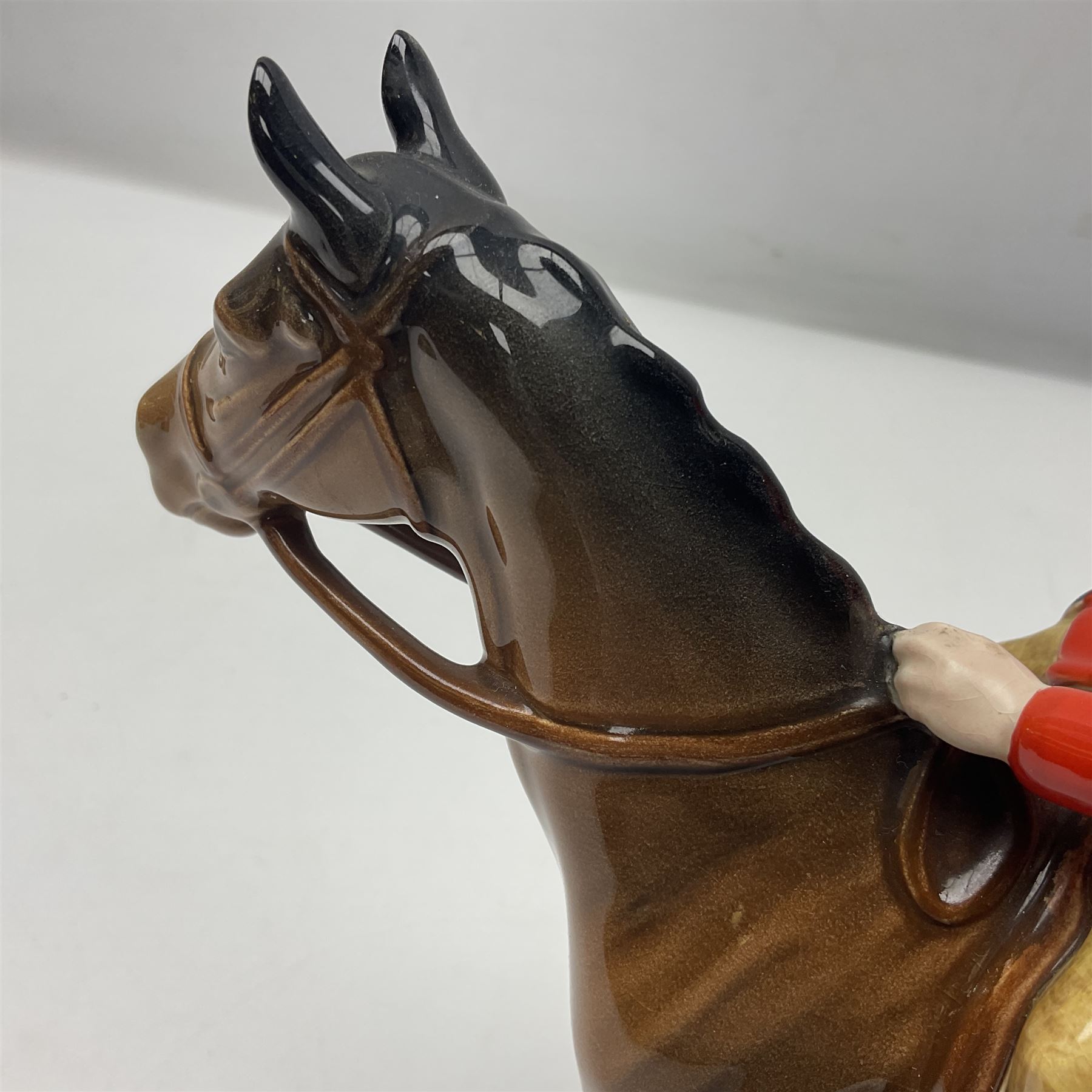 Beswick huntsman upon a bay horse no. 1501, with printed mark beneath, H22cm
