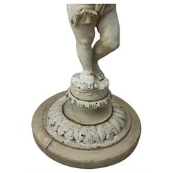 Early 20th century figural torchère, modelled as a standing putto supporting a circular top with tasselled drapery effect, raised on a circular base with foliate moulding; together with a 19th century large carved wood fragment, triangular form with high relief fruit, foliage and shell motif (H23cm, W129cm)