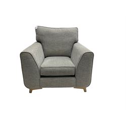 Armchair upholstered in graphite grey fabric, on bracket feet