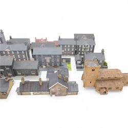 Thirty 00 gauge model railway trackside buildings, six by Martin's Models York including church and terraced houses and twenty-four kit-built examples all grey stone effect houses and farm buildings