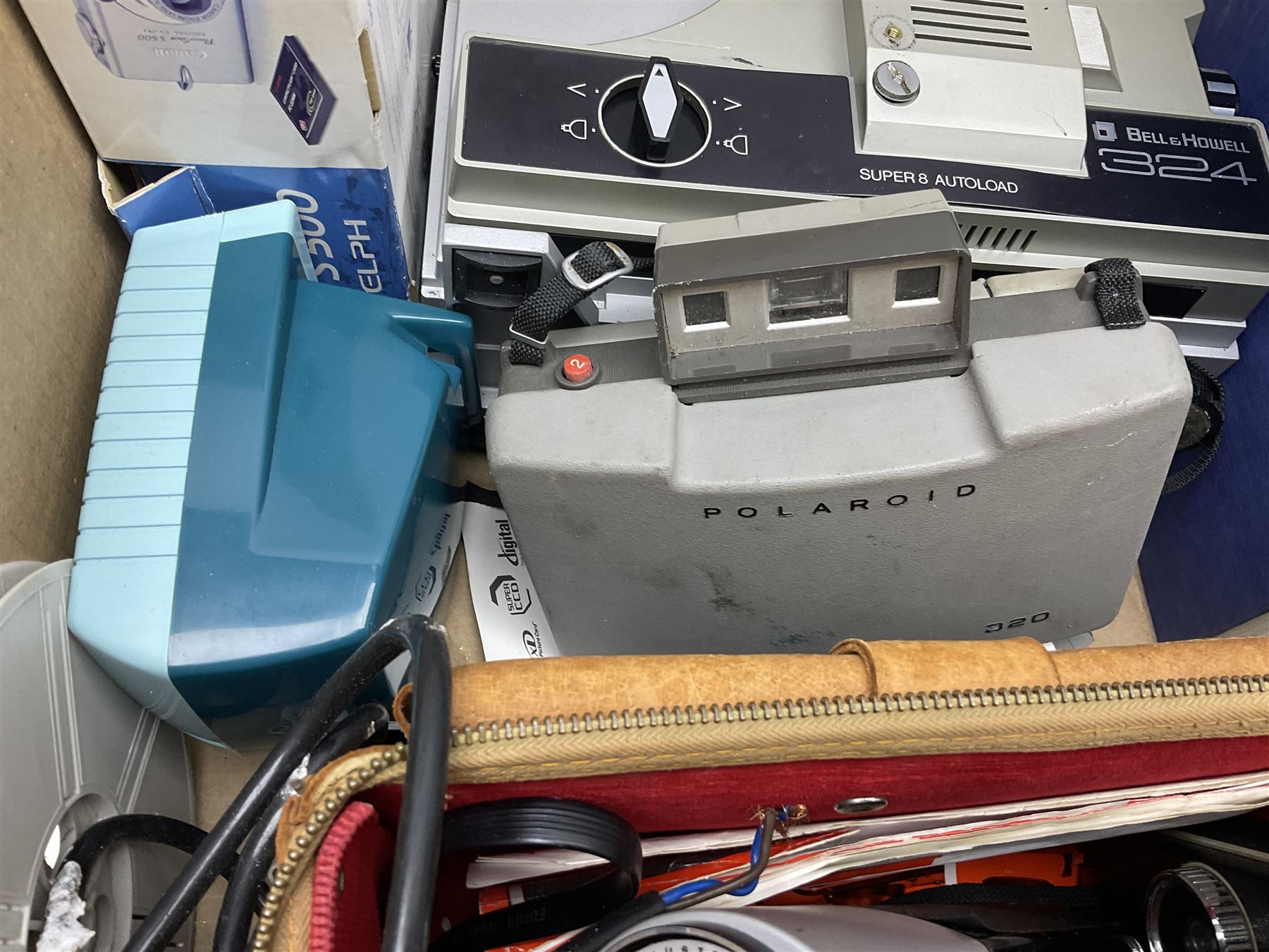 Collection of camera and equipment, to include Canon PowerShot S500, Cosmic 35, polaroid 320, etc, in two boxes  
