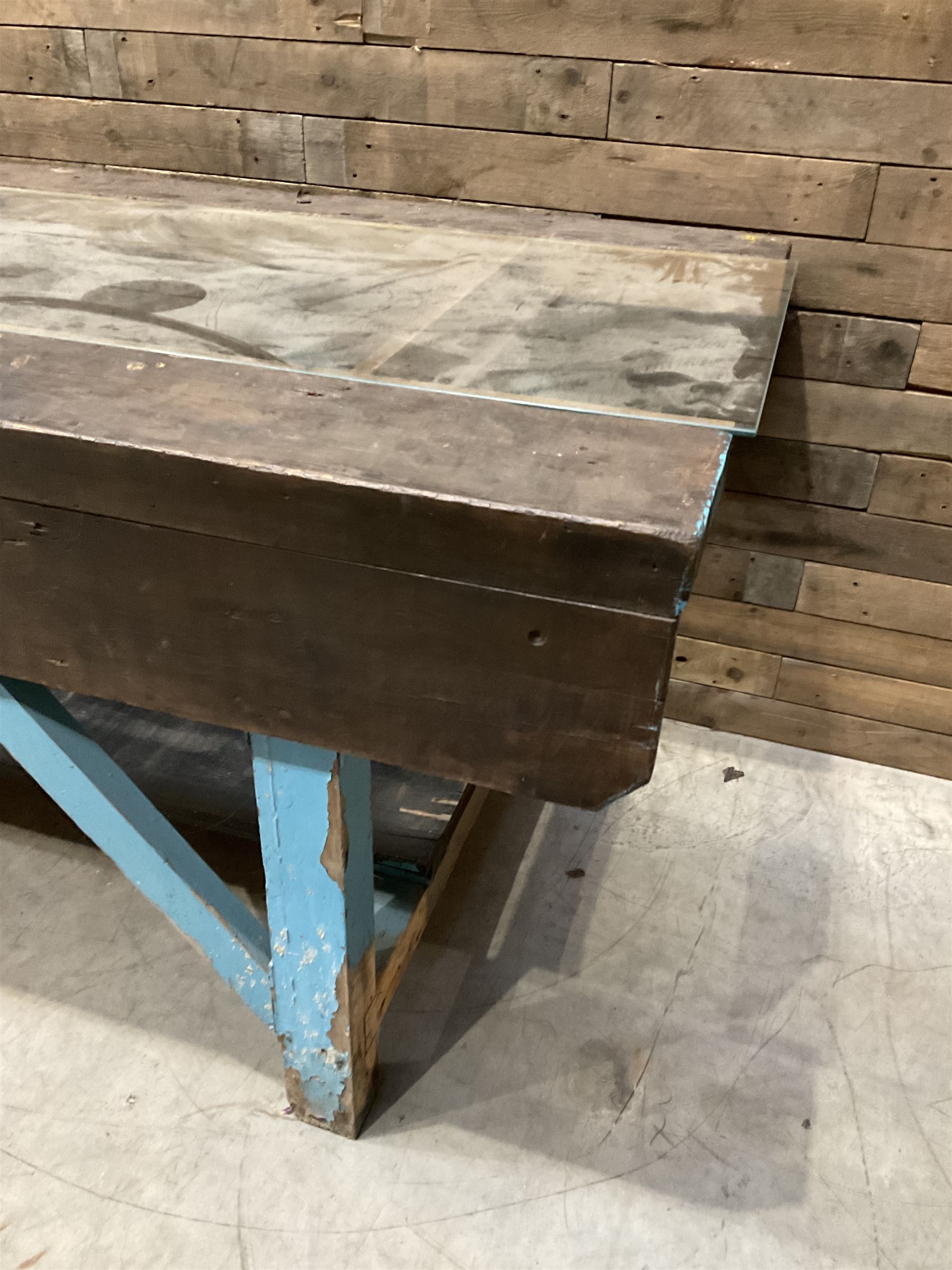 Large timber work bench with central glass section, and two pairs of vintage wooden step ladders (3)