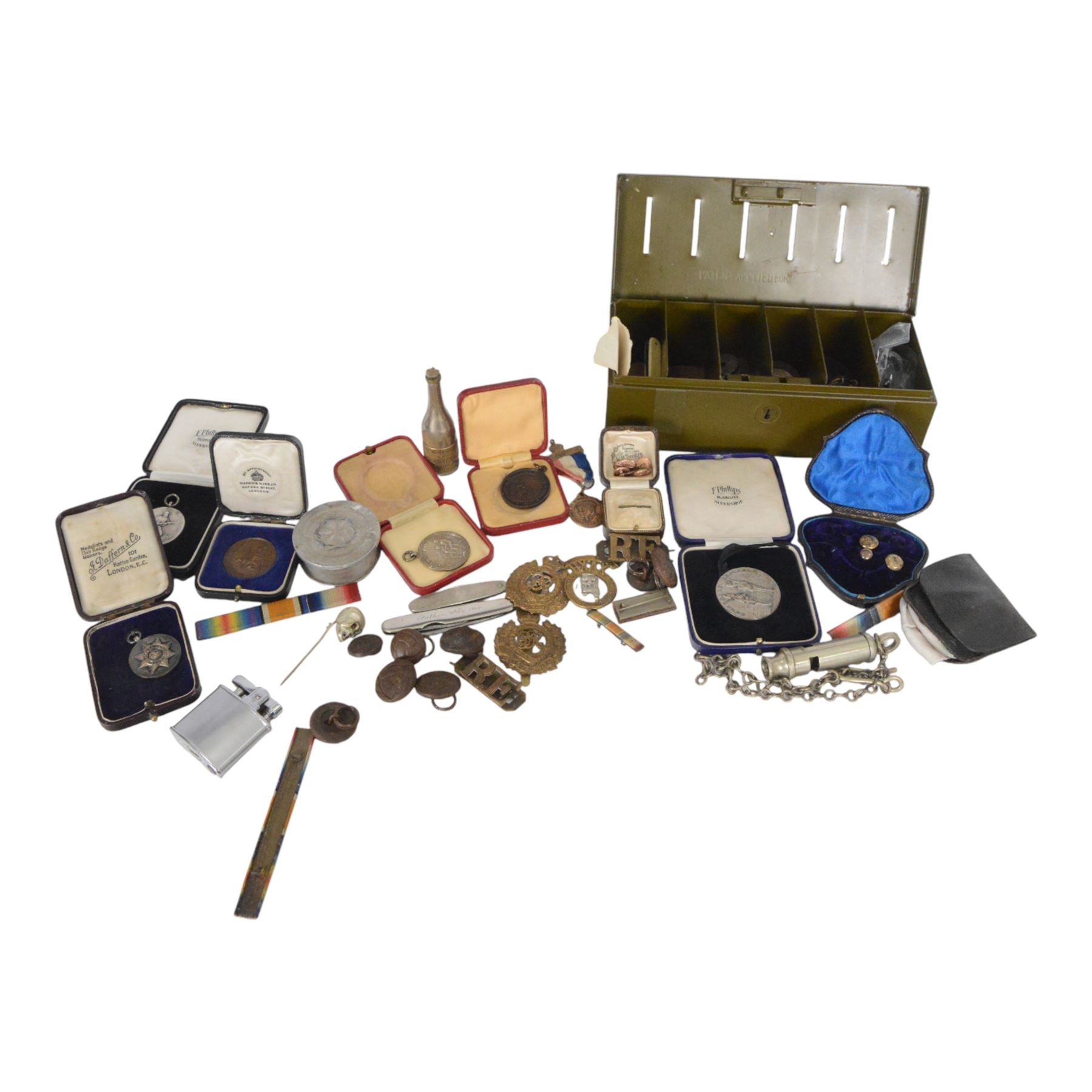 Novelty miniature oil lamp, in the form of Lime fruit juice bottle, together with J Hudson & Co whistle and a collection of medals, badges, buttons, coins, etc