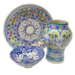  Tin glazed earthenware polychrome decorated charger, D36cm, Persian earthenware baluster vase and blue & white bowl (3)  