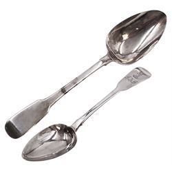 Two Irish silver Fiddle pattern spoons, the first example a table spoon, with rattail bowl, hallmarked James Le Bas, Dublin 1828 and the second example, a dessert spoon with rattail bowl and engraved stag to terminal, hallmarked William Cummins, Dublin 1827 