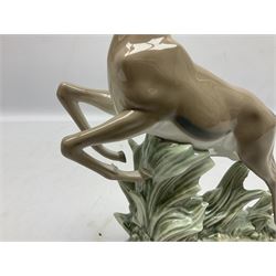 Lladro figure, Gazelle, modelled as a leaping gazelle, with original box, no 5271, sculpted by Vincente Martinez, year issued 1985, year retired 1988, H33cm