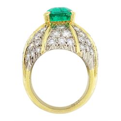 18ct white and yellow gold emerald and diamond dome ring, octagonal cut emerald, surrounded by eight sections of pave set round brilliant cut diamonds, emerald approx 3.65 carat, total diamond weight approx 4.00 carat