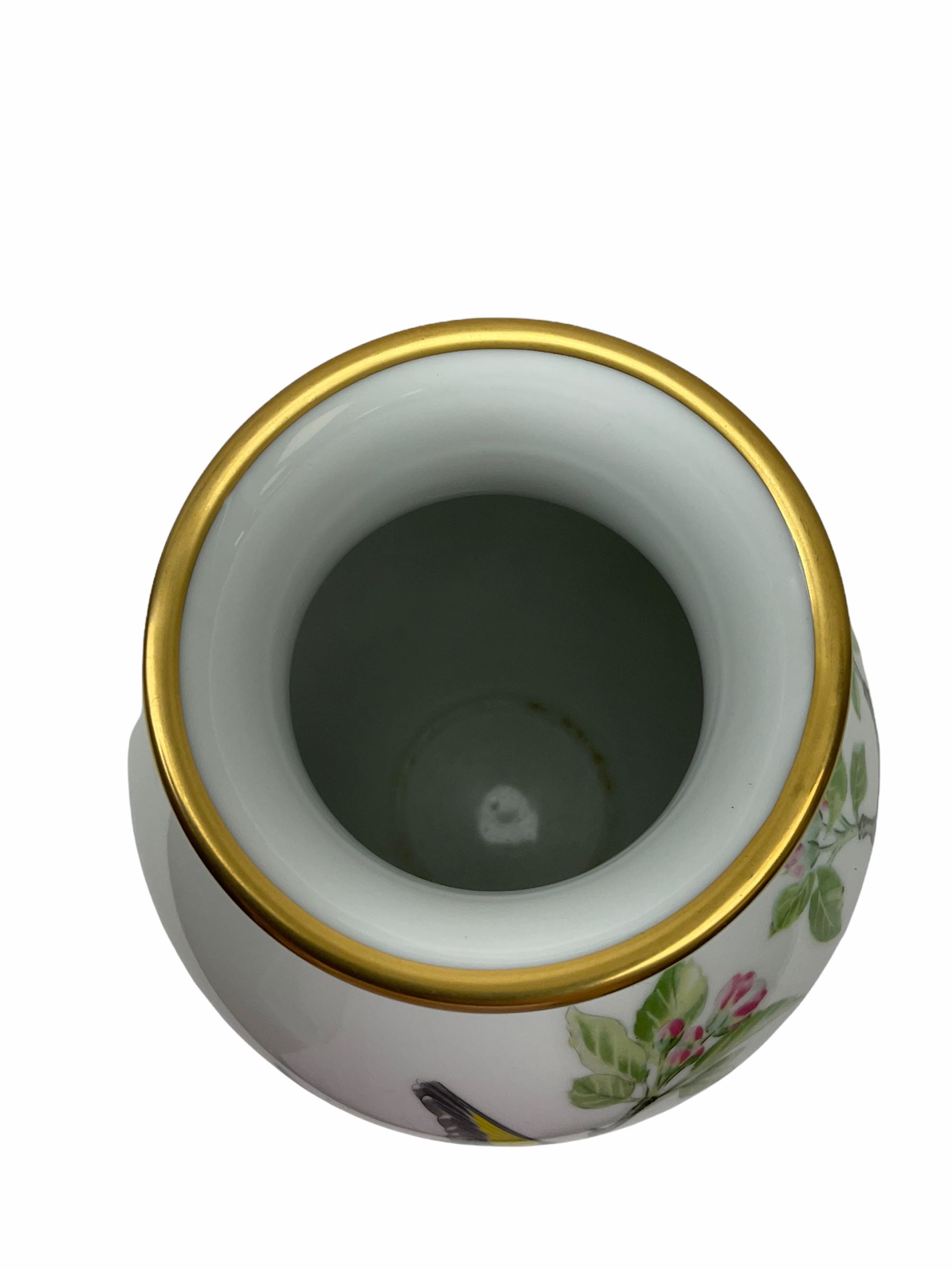 Pair of Franklin Porcelain ovoid vases, The Meadowland Bird Vase and The Woodland Bird Vase by Basile Ede H30cm, with wooden stands and certificates.