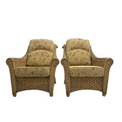 Four piece cane conservatory suite - two seat sofa (W130cm), pair of armchairs (W85cm), and coffee table (85cm x 60cm)