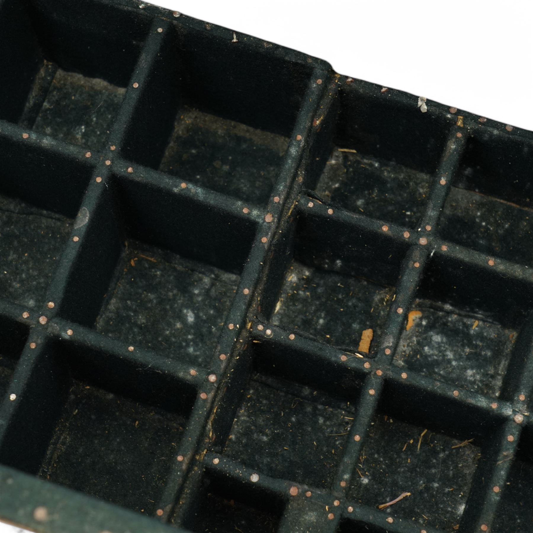 Early 19th century teak and brass bound silver campaign chest, fitted with brass L-shaped brackets and heavy weight carrying handles, the hinged lid enclosing two removeable trays with divisions and lined in blue baize, fitted with two 'R. Cooper & Son' brass locks