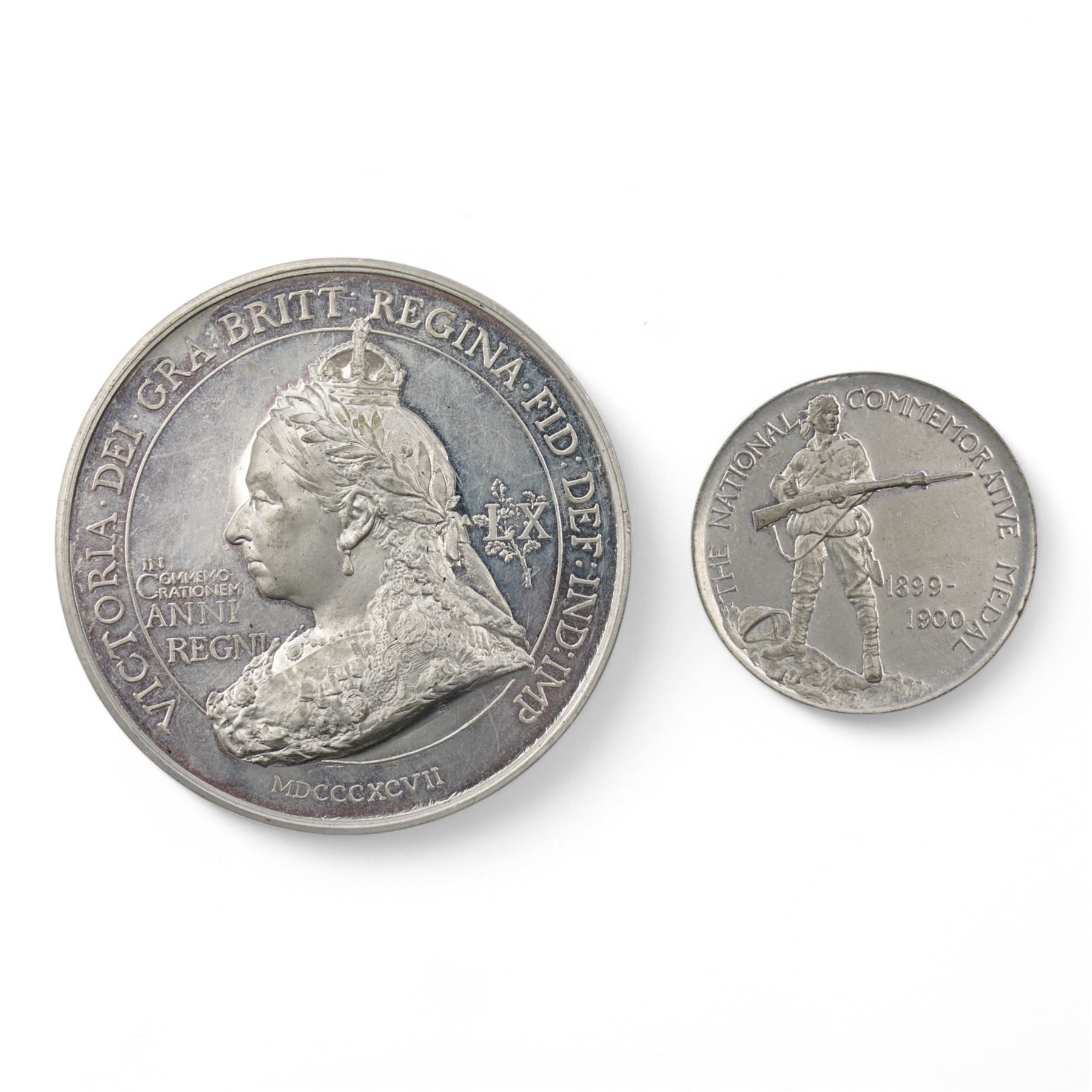 Victoria Diamond Jubilee 1897 - White metal medal by F Bowcher for Spink & Son with names of 50 British Territories on 50 small shields around, D7.5cm and Boer War National Commemorative white metal medal 1899-1900 by F Bowcher for Spink & Son with a soldier holding a rifle with bayonet D4.5cm (2)