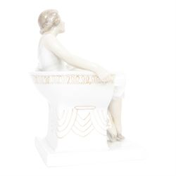 Royal Copenhagen figure no. 894, Woman Seated in a Chair, designed by Axel Locher, H20cm