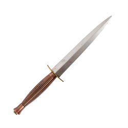 British Commando knife, with 17.5cm double edged blade, with leather scabbard, overall L31cm