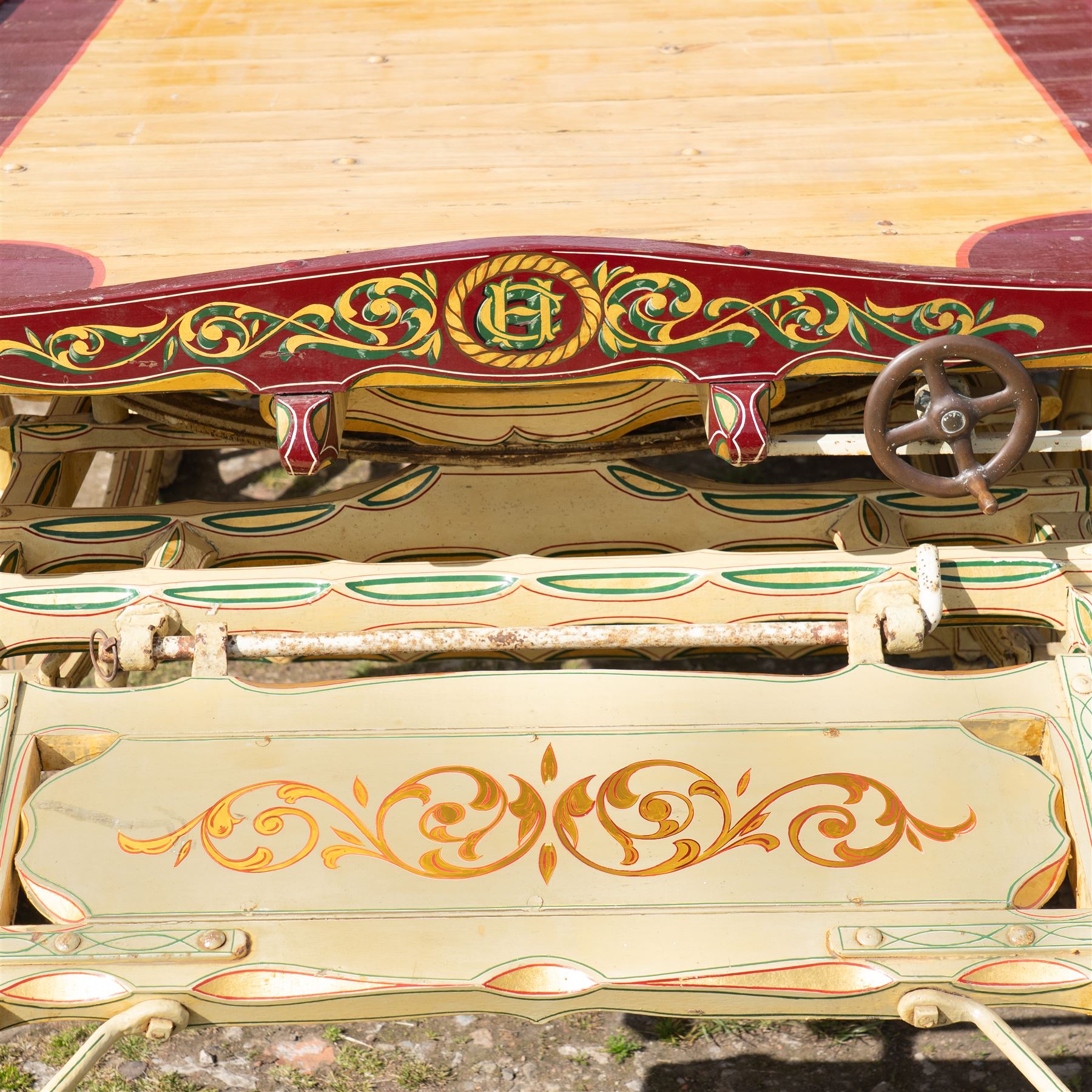 Advertising Trade Dray Wagon for C. Herring & Son, Hartlepool, Dated 1895 and Renovated 1975

An exceptionally decorative late Victorian horse drawn advertising trade dray, built by J. Herring of Hartlepool in 1895 and later renovated by C. Herring in 1975, as recorded by the painted inscription beneath the body. Finished in a striking cream and maroon livery with extensive hand painted signwriting, the wagon carries the name C. Herring & Son, Iron & Steel Processors, Hartlepool along its sides and rear panels. The wagon is fitted with a flat timber loading bed, twin shafts for a single horse, elegant spoked wooden wheels, iron bound tyres, rear headboard and traditional undercarriage with leaf spring suspension. Richly detailed scrollwork and lining throughout make this a particularly attractive example, suitable for collection, display, museum, promotional or coaching purposes.

Features

• Built by J. Herring, Hartlepool, 1895
• Renovated by C. Herring in 1975
• Original style hand painted advertising signwriting
• Flat timber loading platform
• Raised rear headboard with decorative pierced gallery
• Twin shafts for a single horse
• Wooden spoked wheels with iron tyres
• Traditional leaf spring suspension
• Extensive decorative lining and scrollwork throughout
• Attractive cream and maroon colour scheme
• Suitable for private collection, museum or display use

Dimensions:
Overall length: 560 cm
Body length: 300 cm
Width: 158 cm
Height: 150 cm

Wheel Diameters:
Front wheels: 76 cm
Rear wheels: 86 cm