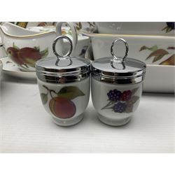 Royal Worcester Evesham pattern, including covered pot de cremes, twin handle tureen, serving dishes, flan dishes, side plates etc  