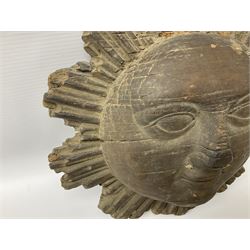Carved pine mask of the sun, probably late 17th/early 18th century, originally a cresting, bearing Christie's lot labels, D20cm

Provenance 
Lot 161, Christopher Howe - The First Twenty Years, Christie's. 24th March 2004
