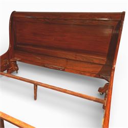Victorian style mahogany super king sleigh bed with bases, shaped panelled headboard and footboard with scrolled ends, moulded side rails, raised on block supports with castors