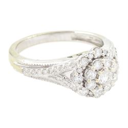 9ct gold diamond cluster ring, set with round brilliant cut diamonds and diamond set shoulders, hallmarked, total diamond weight 0.50 carat