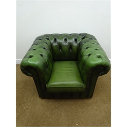  Chesterfield armchair upholstered in deeply buttoned green leather, W98cm  