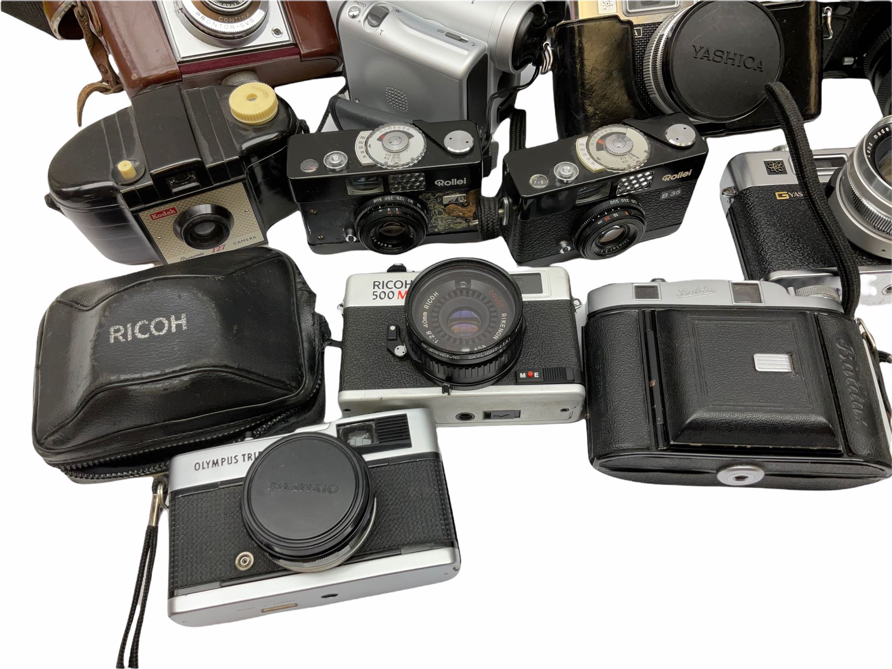 Collection of cameras, to include three Olympus Trip 35,  Balda Super Baldax, Seagull 4A TLR Camera, Pentax MG, Pentax-MV1, Yashica, two Yashica Electro 35, Rollei B35, Fujica 35 EE etc. 