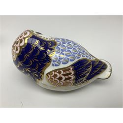 Three Royal Crown Derby paperweights, two examples modelled as ducks, one with gold stopper, the other with silver, an owl lacking stopper, and an Imari patterned frog lacking stopper (4)
