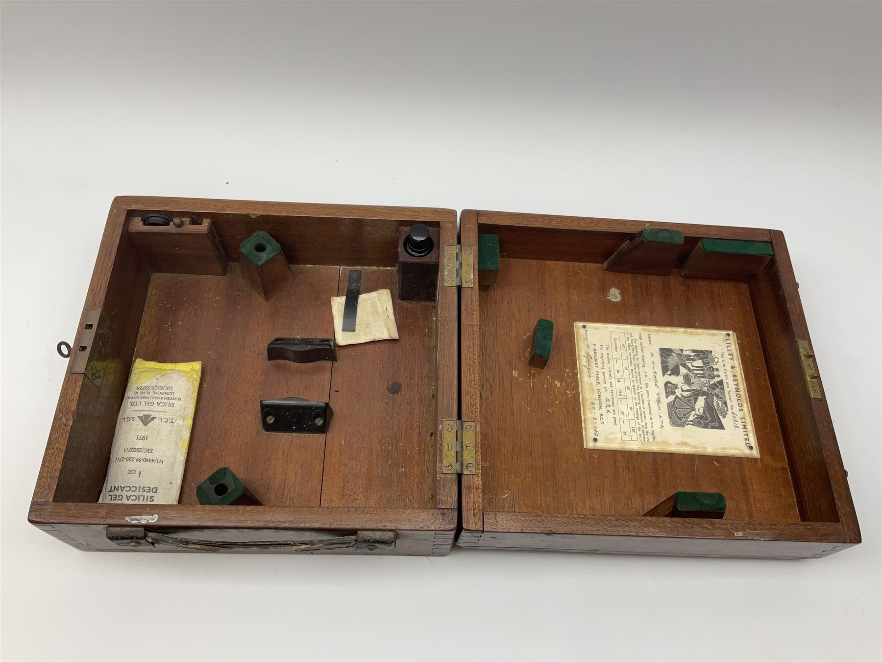 Henry Hughes & Son Ltd. sextant with black crackled finish, brass and silvered graduated arc and various coloured glass filters, serial no.60818, in fitted mahogany carrying box bearing Lilley & Reynolds Ltd. certificate dated 1962 W26cm