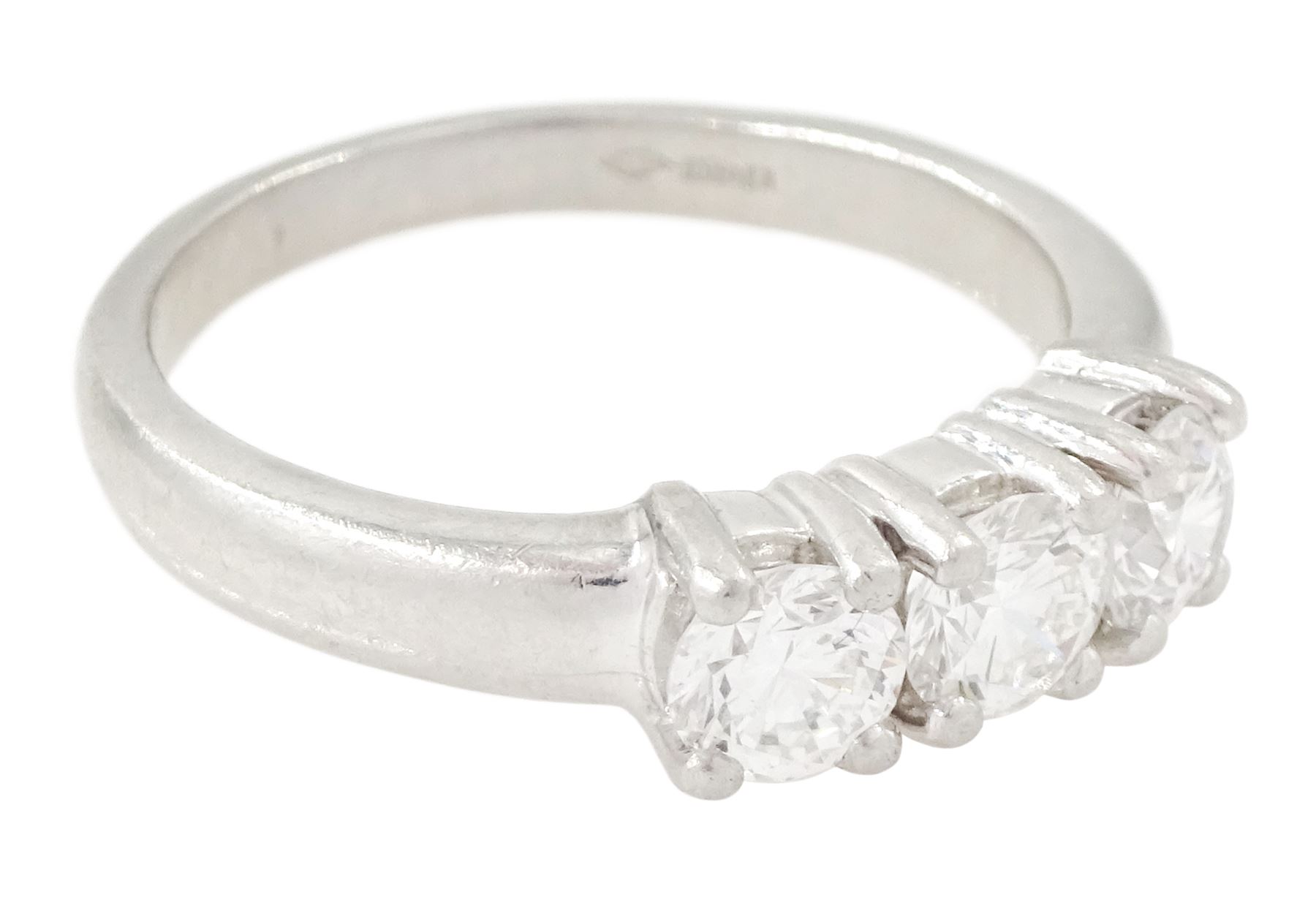 Platinum diamond three stone ring, each four claw set with a round brilliant cut diamond, hallmarked, total diamond weight approx 1.00 carat