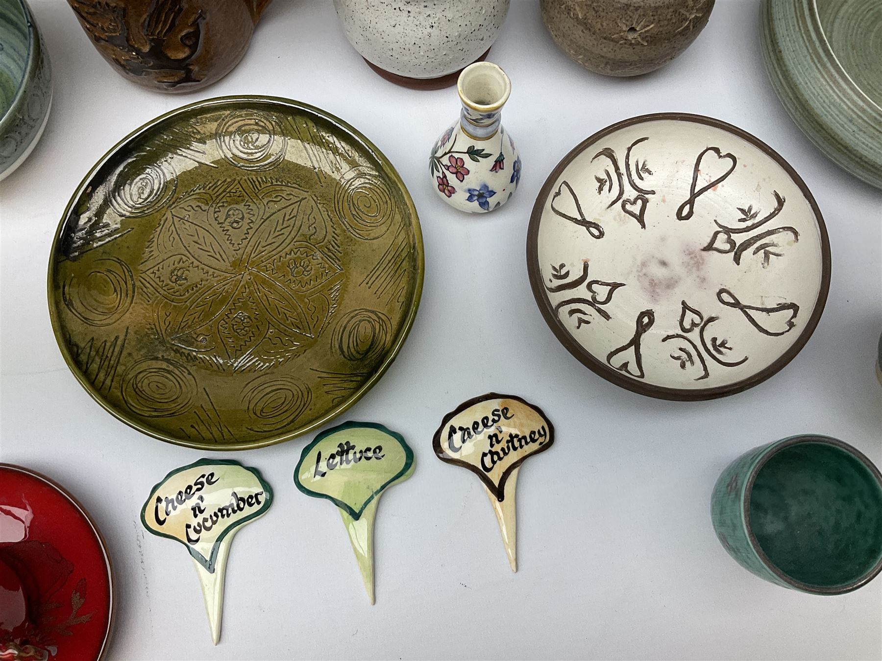 Quantity of studio pottery to include square section vase decorated with blossoming branches, other studio pottery to include jugs, bowls, vases etc, with various marks, duck egg b,J.E. bowl stamped Buchan, continental pottery, other stoneware pottery to include glazed jar with lid etc