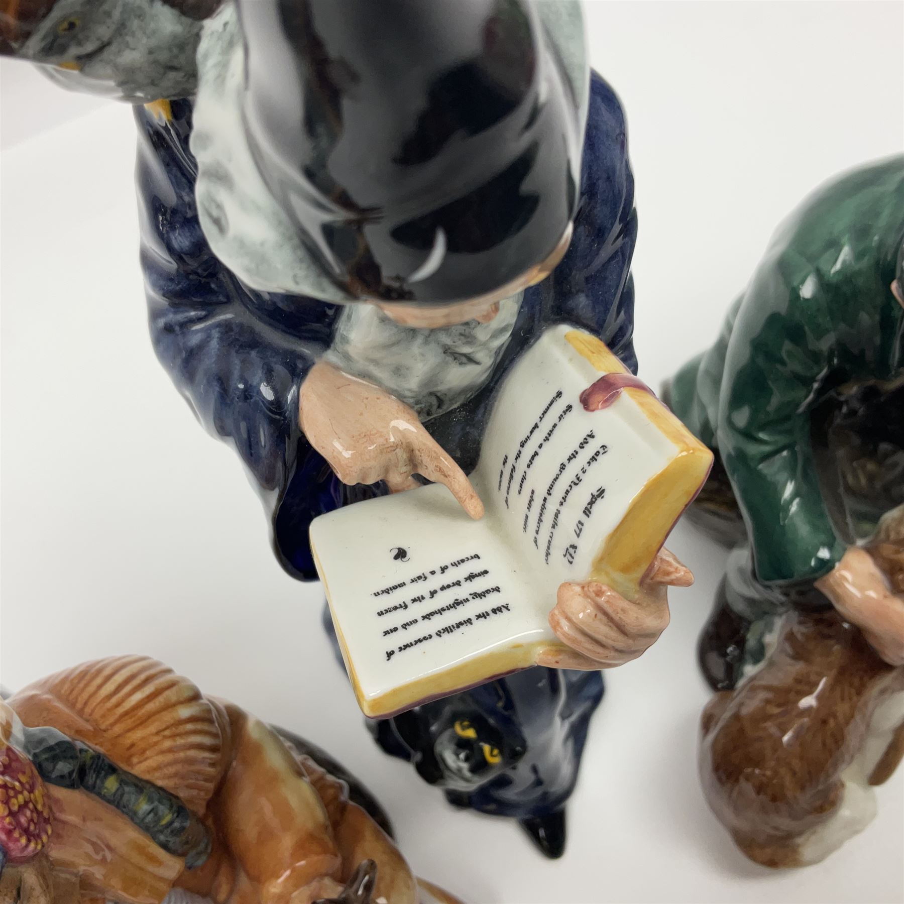 Three Royal Doulton figures, comprising The Wizard HN2877, The Chief HN2892, The Master HN2325