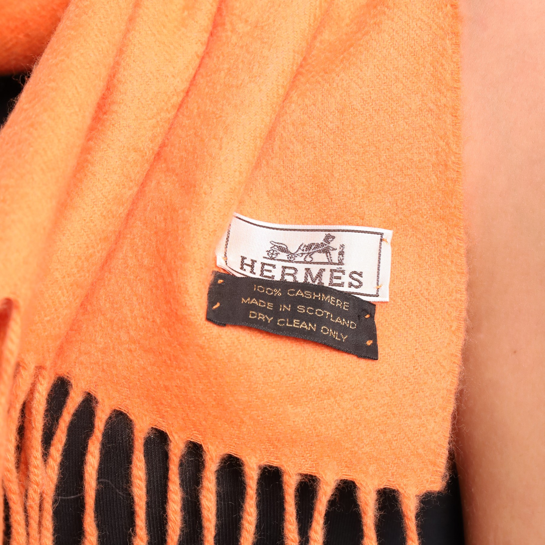 Hermès - orange cashmere scarf, with fringed ends and woven Hermès Paris label, made in Scotland 