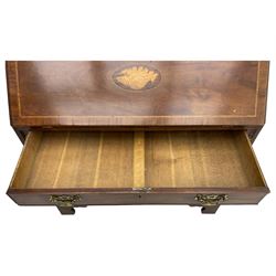 George III mahogany bureau, the conch inlaid fall front enclosing pigeon holes, shelves and central cupboard with inlaid flower motif, four graduating cock-beaded drawers below each with brass handles, lower moulded edge over shaped bracket feet