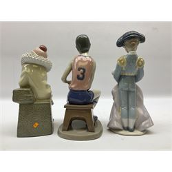 Three Lladro figures, comprising Timid Torera no 6091, Little Jester no 5203 and Basketball Player no 6091, all with original boxes, largest example H24.5cm 