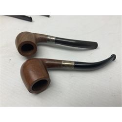 Collection of eight silver mounted pipes, comprising a briar wood Imperial ITC example with silver collar hallmarked A.W Birmingham 1903, horn handled example with silver collar hallmarked LB, probably Louis Blumfeld, Birmingham 1900, three examples marked B.W, one marked Globe A.O.C, Blumfeld's Best Briar pipe marked BBB and Riseagle example, together with two further pipes (10)