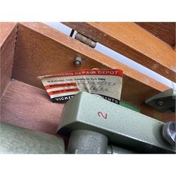 Vickers Instruments England Cooke V22 surveyor's theodolite, No.V.221387, with green enamelled body H32cm; in fitted wooden carrying box with retaining bar and repair label dated 3/8/77.