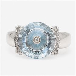 9ct white gold sky blue topaz and diamond Lehrer Torus ring, single round cut topaz of app...