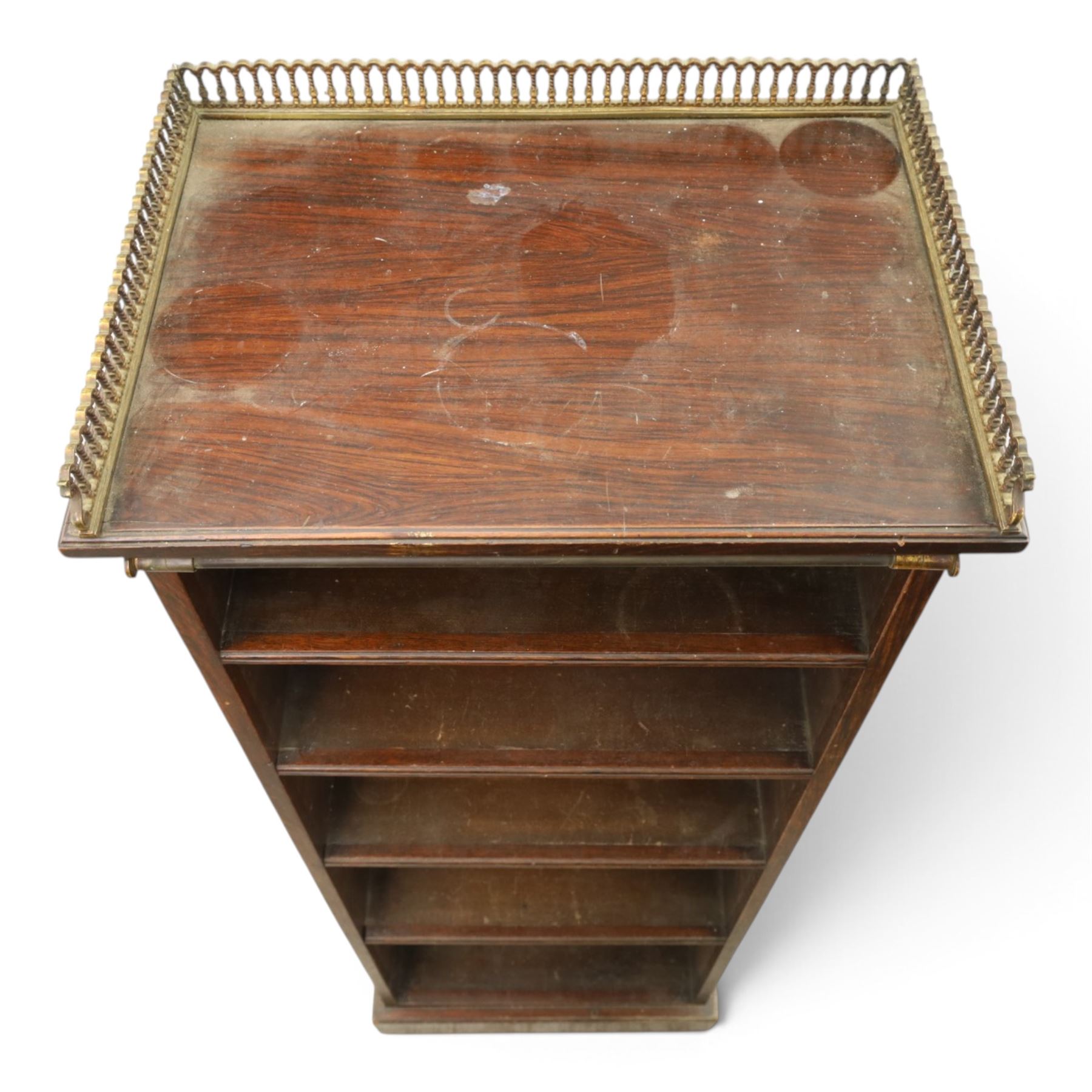 Victorian rosewood bookcase, pierced brass three quarter gallery, with four graduating shelves, raised on a plinth base 