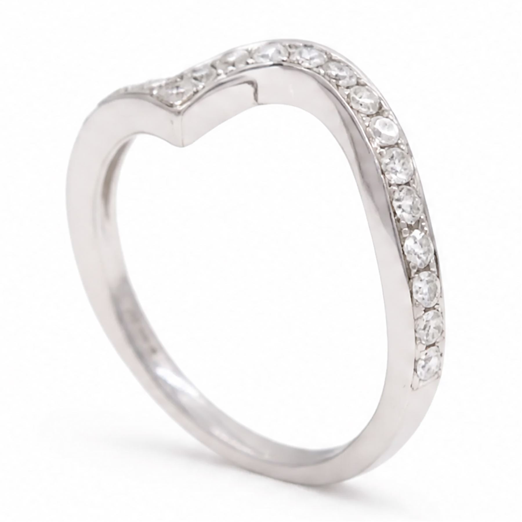 18ct white gold diamond abstract wishbone ring, channel set with twenty round brilliant cut diamonds, hallmarked