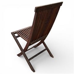 Hexagonal garden table and set of four folding chairs