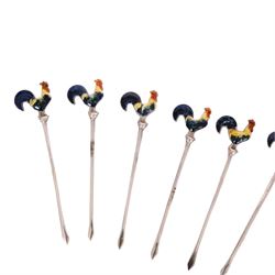 Set of six early 20th century silver cocktail sticks with enamel cockerel finials, stamped Sterling Silver